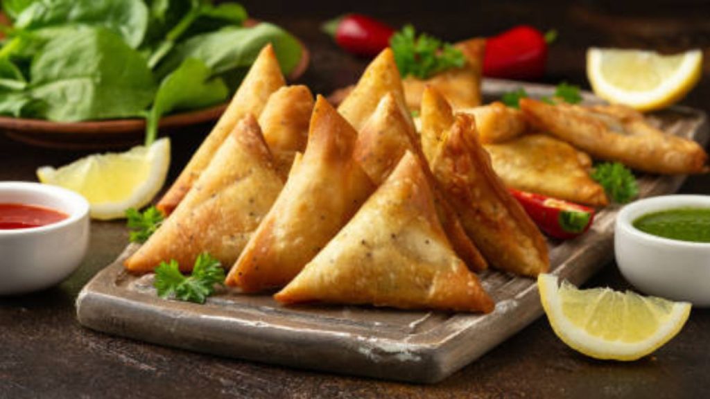 Samosas and Pakoras Unveiled: A Culinary Odyssey Exploring Origins, Variations, and Global Influence